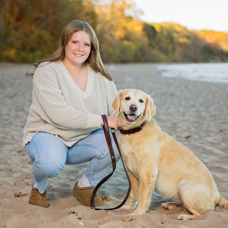 Headshot of Isabelle Mikkelson with dog