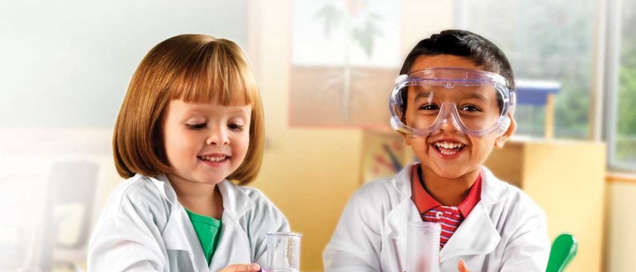 Photo of children pretending to be scientists.